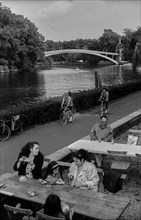 Germany, Berlin, 27 June 1991, garden pub, Zenner-Garten in Treptower Park, background: bridge to