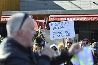 CHRISTCHURCH, NEW ZEALAND, JULY 24, 2021, A man speaks at a protest rally at the Bridge of