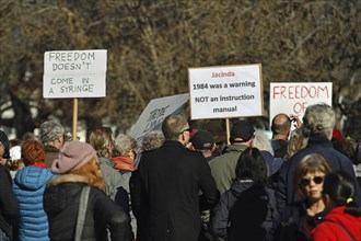 CHRISTCHURCH, NEW ZEALAND, JULY 24, 2021, People at a protest rally at the Bridge of Remembrance in