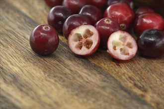 Rustic kitchen scene with fresh cranberries a symbol of health and wellness, often referred to as a