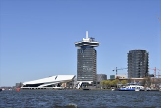 Amsterdam, Netherlands. April 2023. The river IJ with the Eye museum and a canalboat