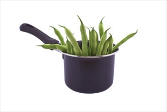 A handful of green beans in the pot isolated on white background. Healthy, nutritious vegetarian