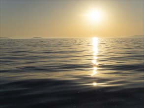 Evening sun over the sea, in front of sunset, island world off Vodice, Dalmatia, Croatia, Europe