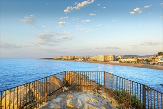 Blanes city and beach from Sa Palomera rock at morning in Spain