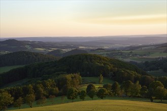 Evening mood on the Weiherberg between Dietges and Sieblos, view of the Milseburger Kuppenrhön,