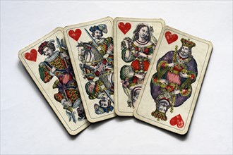 Old playing cards of hearts by Ferdinand Piatnik and Sons around 1900, Vienna, Austria, Europe