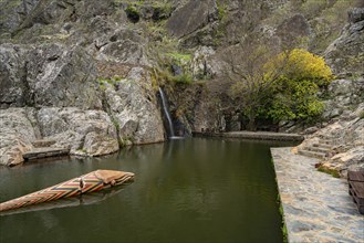 Penha Garcia historic village waterfall and Pego river beach on a cloudy day, in Portugal