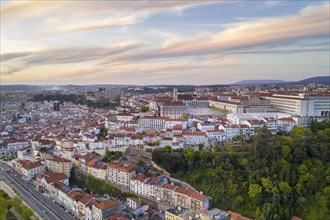 Coimbra drone aerial of beautiful buildings university at sunset, in Portugal