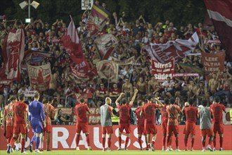 Football match, the FC Bayern Munich team united after the victory in the curve to celebrate with