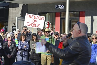 CHRISTCHURCH, NEW ZEALAND, JULY 24, 2021, A man speaks at a protest rally at the Bridge of