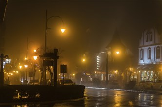 GRAMADO, RIO GRANDE DO SUL, BRAZIL, August 10, 2018: Street of Gramado in cold and hazy night