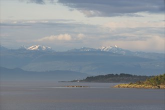 View from Vancouver Island across the Strait of Georgia towards the coastal mountains on the