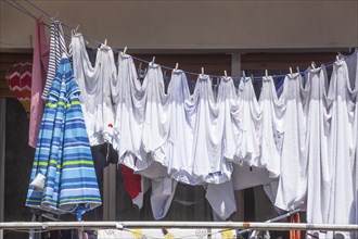 Clothesline with hanging laundry on a balcony, Diepholz, Lower Saxony, Germany, Europe