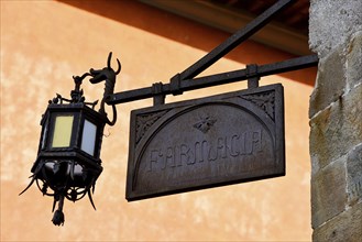 Pisa, Italy. September 16, 2023. An old signboard at a pharmacy in in Pisa, Italy, Europe