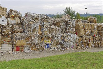 Paper and carboard carton material stacked for recycling