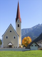 Zell am Ziller, Tyrol, Austria. September 2012. The church of Zell am Ziller with a golden autumn