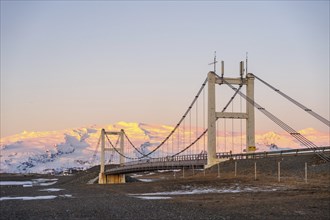 Beautiful sunrise view of Jokulsarlon ice lake bridge at night in winter. Iceland