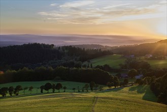 Evening mood on the Weiherberg between Dietges and Sieblos, view of the Milseburger Kuppenrhön,