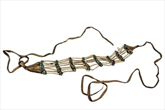 Indian necklace made from shells, turquoises and leather strips on a white background