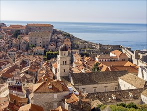 A historic city with red roofs and a church tower by the sea, Dubrovnik, Mediterranean, Croatia,