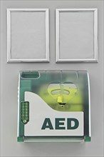 Aed defibrillator in the box at wall