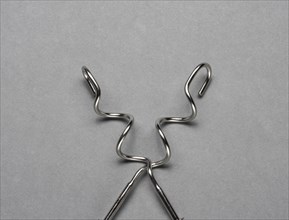 Two kneading hooks on grey background