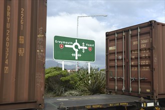 HOKITIKA, NEW ZEALAND, AUGUST 29, 2020: A freight train crosses the main street of Hokitika near