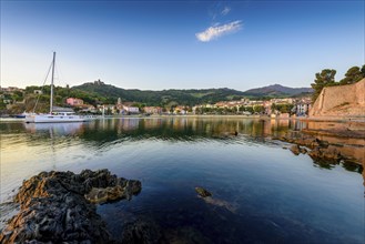 Collioure harbor and medieval castle at sunrise at Occitanie in France