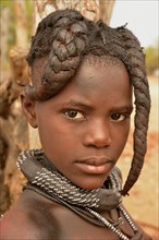 Himba girl with typical hairstyle, Omuramba, Kaokoland, Kunene, Namibia, Africa