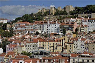 View over the historic Alfama district towards Castelo de Sao Jorge Castle, Lissabon, Portugal,