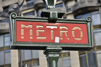 Old sign "Metro" at a subway station, Paris, France, Europe