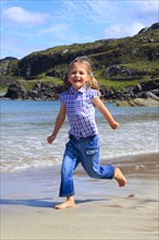 Girls on the beach, Sutherland, Scotland, Great Britain