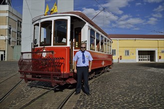 Tram driver Nunu Martinho at the Museu da Carris tram museum, Lisbon, Portugal, Europe