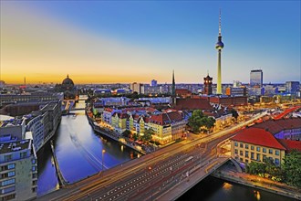 City panorama with Spree, Cathedral, Nikolai Quarter, Red City Hall and TV Tower in the evening,