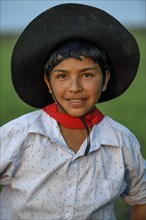 Young gaucho at Puesto Mingo, portrait, Esteros del Iberá, at Concepción del Yaguareté Corá,