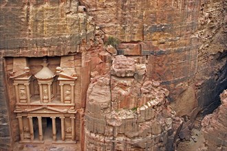 Al Khazneh, the treasury, carved out of a sandstone rock wall in the ancient city of Petra in