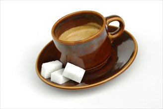 Cup of espresso with sugar, household sugar, sugar cubes, coffee