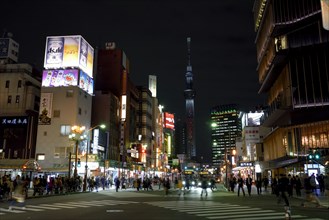 Street scene in the district Asakusa, in the background the Skytree, with 634 meters the highest