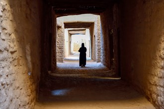 Local Veiled Woman in the Old City of AlUla, Medina Province, Saudi Arabia, Arabian Peninsula, Asia