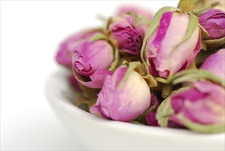 Dried rosebuds in bowl