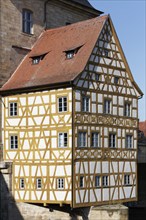 Historic town hall on the Regnitz, Rottmeisterhäuschen with coloured half-timbering, Bamberg, Upper