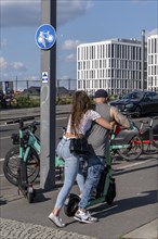 Tourists on electric scooters in inner-city traffic, Berlin, Germany, Europe