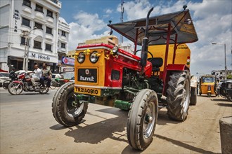 KANCHIPURAM, INDIA, SEPTEMBER 12, 2009: Wheeled tractor in indian street