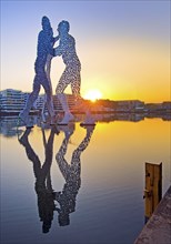 Molecule Man, monumental artwork in the Spree at sunrise, artist Jonathan Borofsky, Berlin,