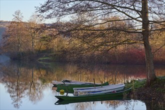 Lake with boats at sunrise, Freudenberg am Main, Untermain, Spessart, Odenwald, Franconia,