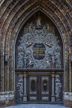 Richly decorated west portal with tetragram in Hebrew, Nikolaikirche Hanseatic City of Stralsund,