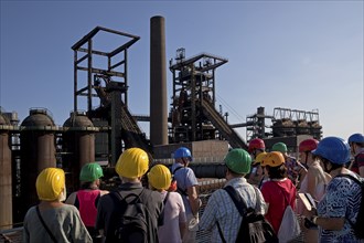 Group on the skywalk with a view of the blast furnaces, former Phoenix West industrial plant,