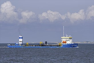 Trailing suction hopper dredger, TSHD Krakesandt sailing the Western Scheldt, Westerschelde along