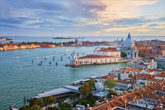 Aerial view of Venice lagoon and Santa Maria della Salute church on sunset. Venice, Italy, Europe