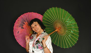 Asian dance with umbrellas